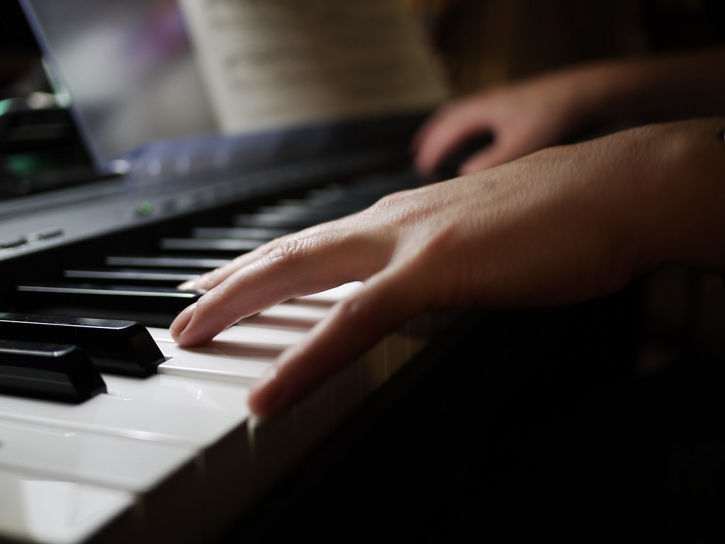 A man playing a piano.