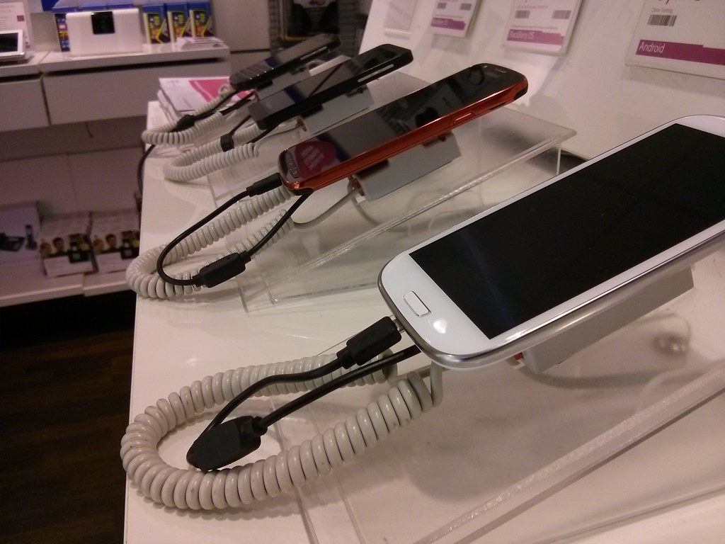 A line up of phones that are being charged. This is the image that represents the page about Coltan.